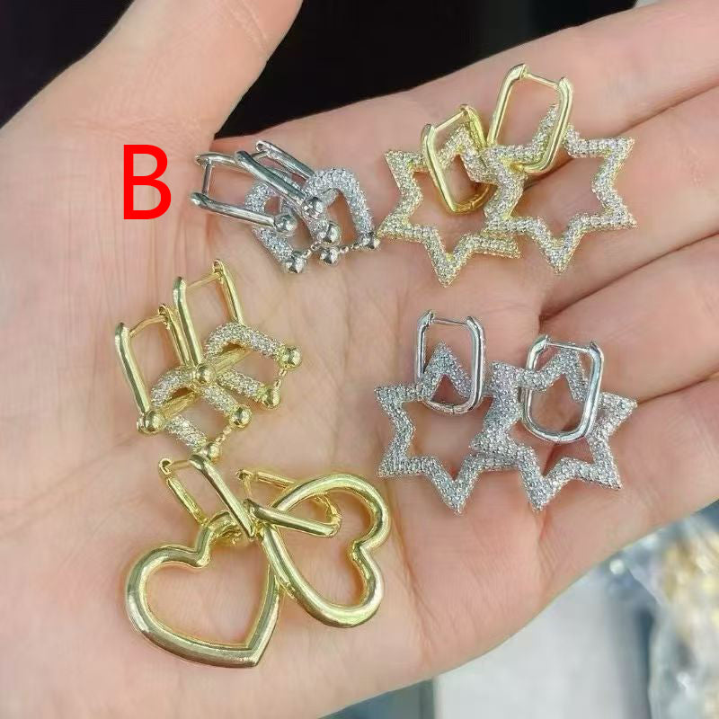 A Brass And Diamond Horseshoe Earrings