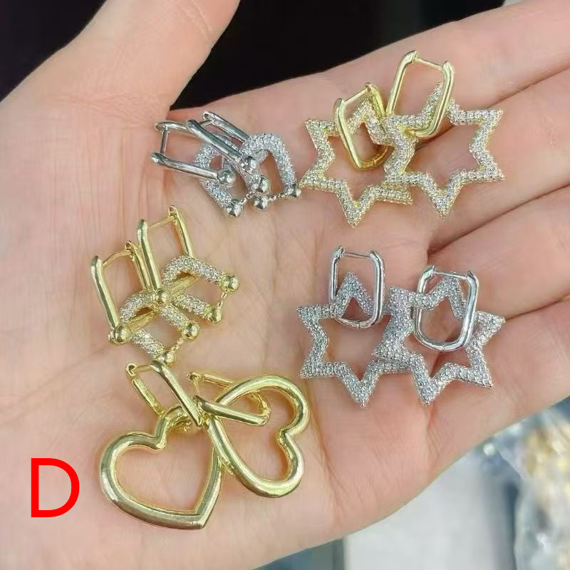 A Brass And Diamond Horseshoe Earrings