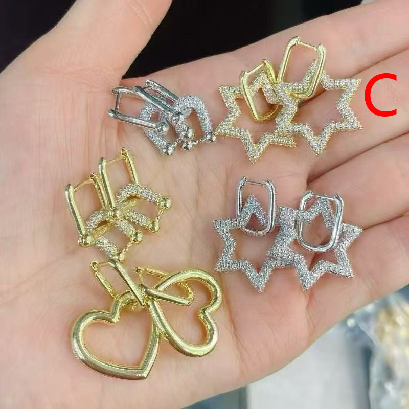 A Brass And Diamond Horseshoe Earrings