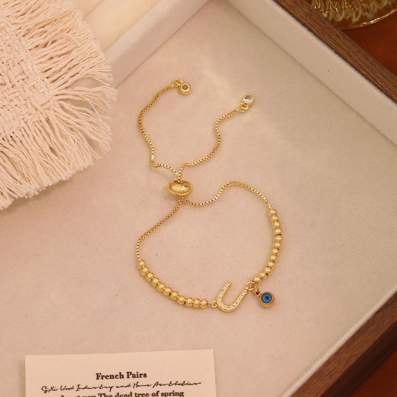 A Copper 26-letter Eye Bracelet