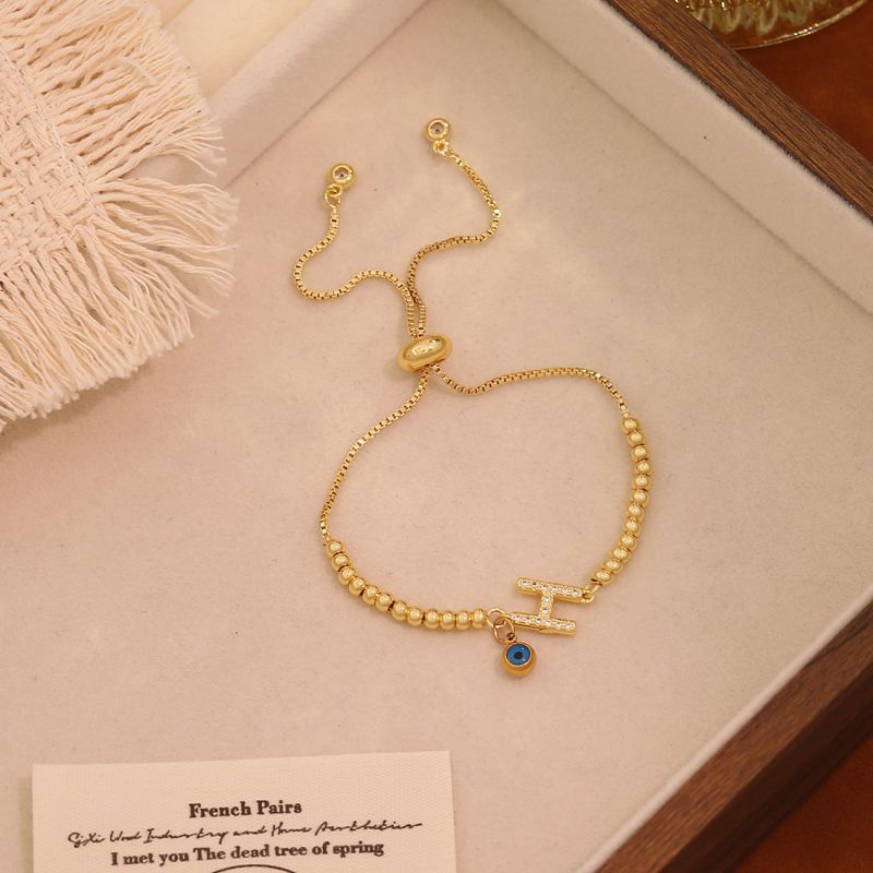 A Copper 26-letter Eye Bracelet