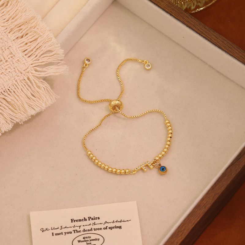 A Copper 26-letter Eye Bracelet