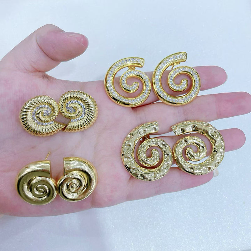 A Copper And Diamond-encrusted Conch Earrings