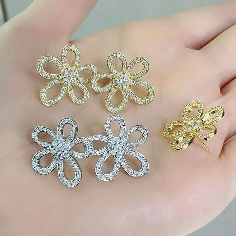 A Copper And Diamond-encrusted Flower Earrings