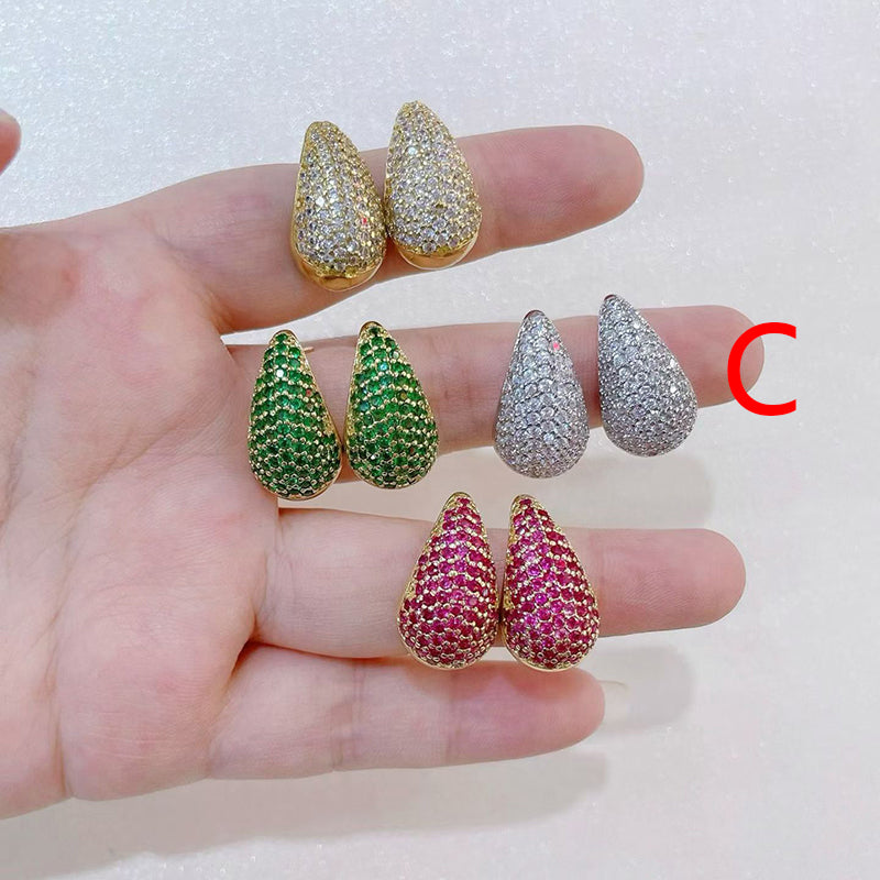 A Copper And Diamond-encrusted Teardrop-shaped Earrings