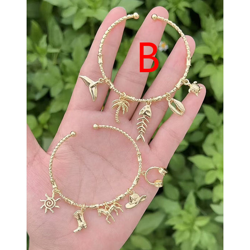 A Copper And Gilded Pony Boot Bracelet