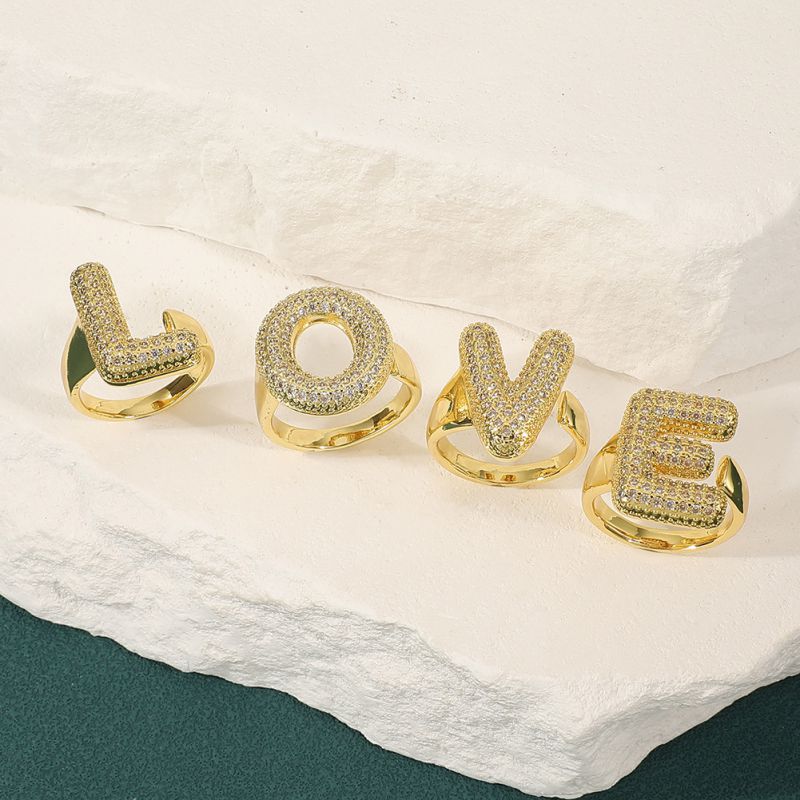 A Copper Diamond 26 Letter Open Ring