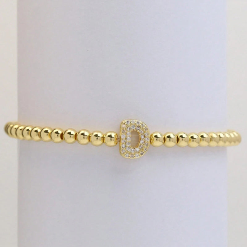 A Copper Plated Gold And Diamond Beaded 26 Letter Bracelet