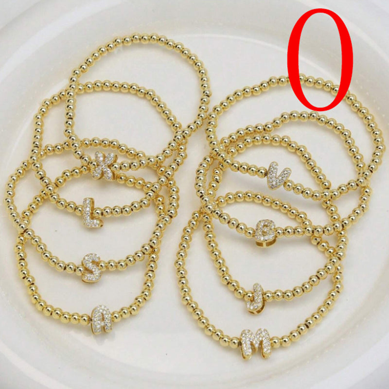 A Copper Plated Gold And Diamond Beaded 26 Letter Bracelet