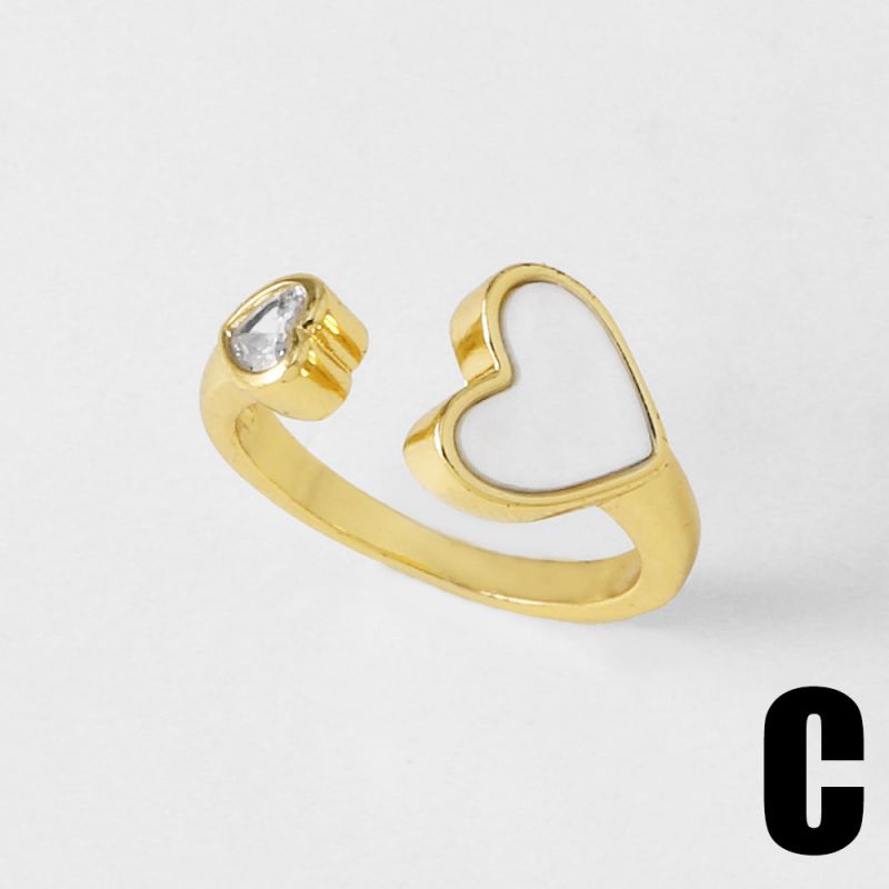 A Copper Round Ring With Diamonds