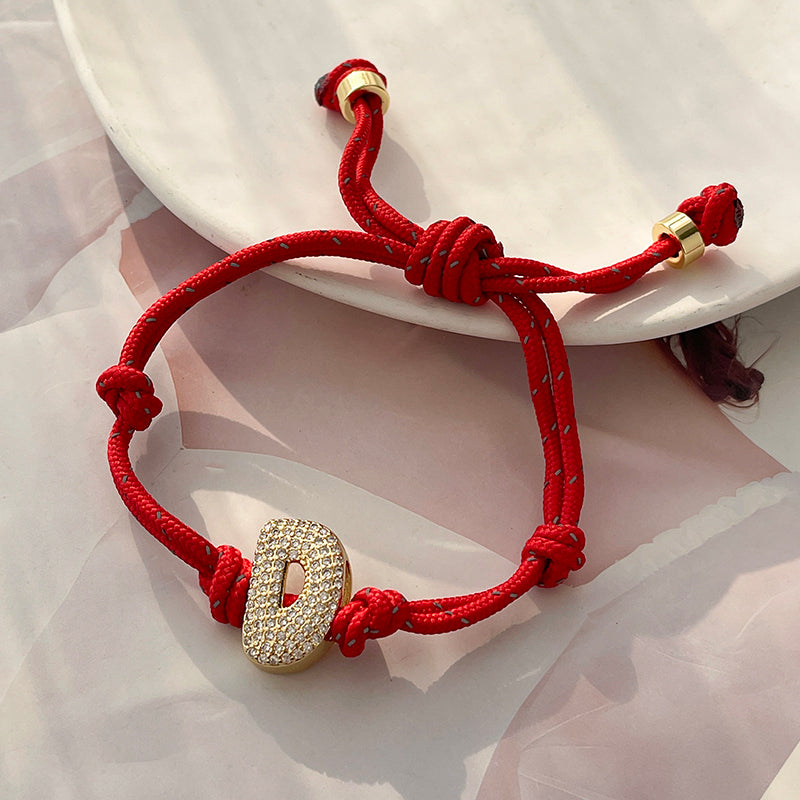 A Gold Copper-set Zircon 26-letter Alphabet Bracelet