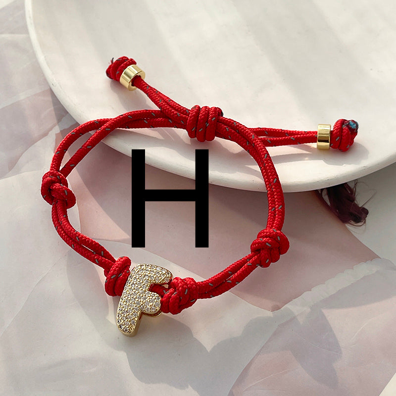 A Gold Copper-set Zircon 26-letter Alphabet Bracelet