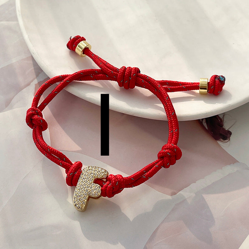 A Gold Copper-set Zircon 26-letter Alphabet Bracelet