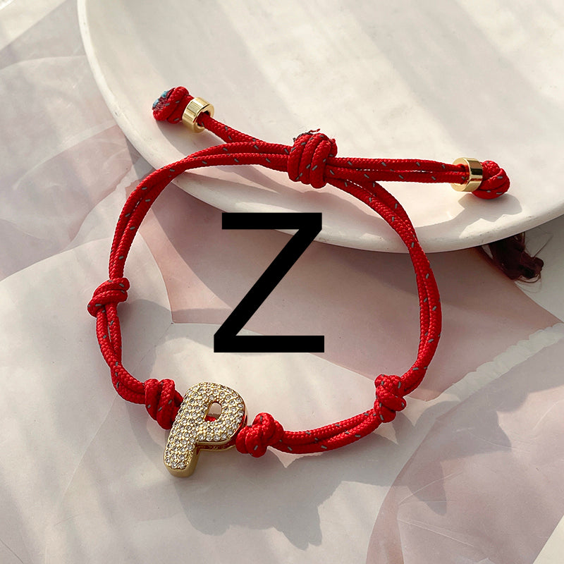 A Gold Copper-set Zircon 26-letter Alphabet Bracelet