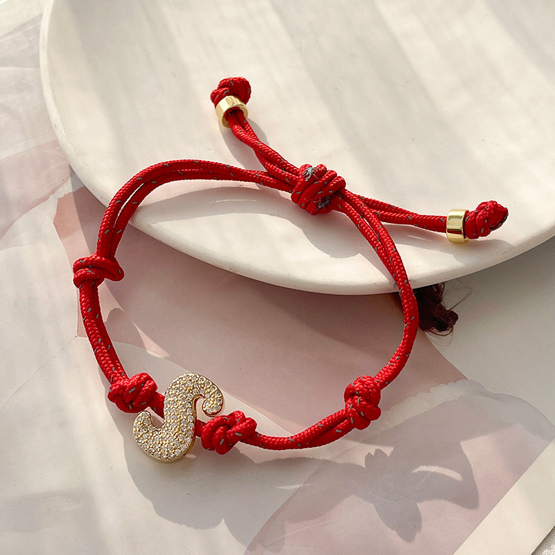 A Gold Copper-set Zircon 26-letter Alphabet Bracelet