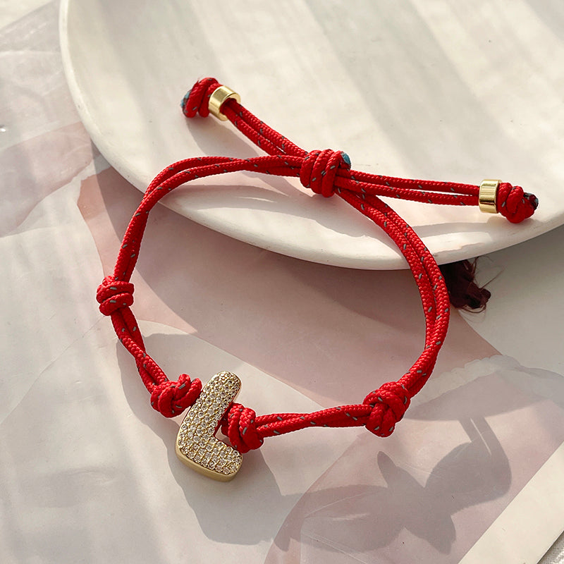 A Gold Copper-set Zircon 26-letter Alphabet Bracelet