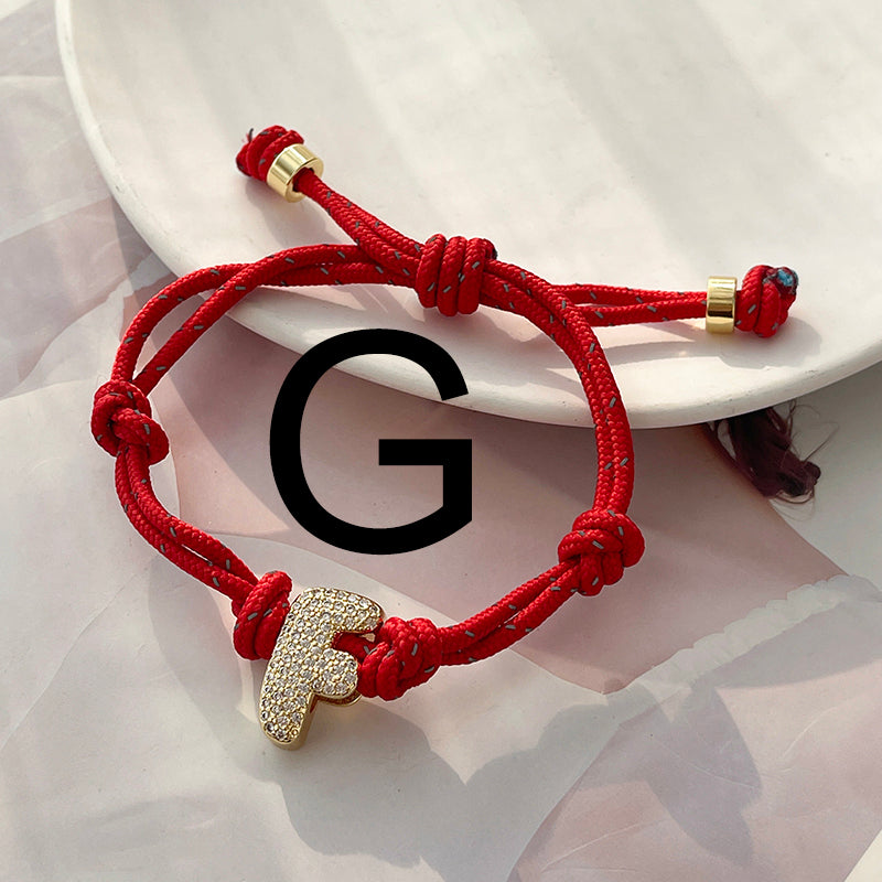 A Gold Copper-set Zircon 26-letter Alphabet Bracelet