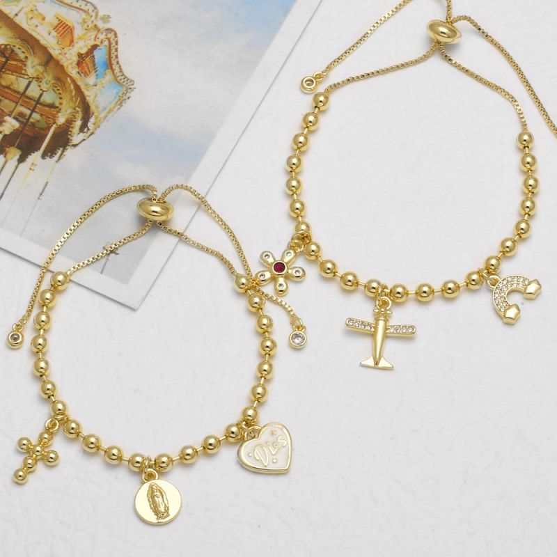 A Gold-plated Copper Heart-shaped Cross And Portrait Bracelet