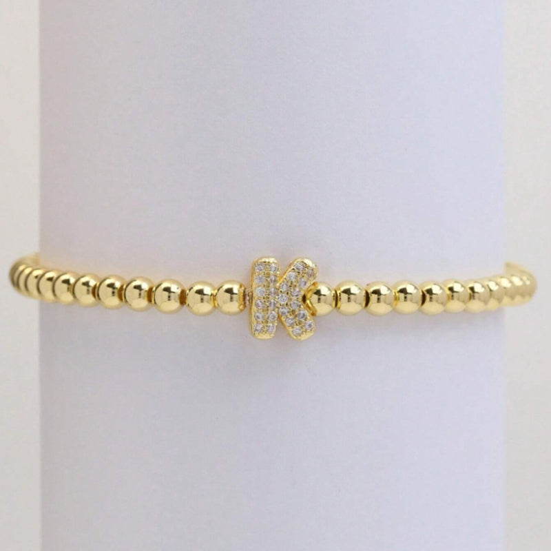 A Copper Plated Gold And Diamond Beaded 26 Letter Bracelet