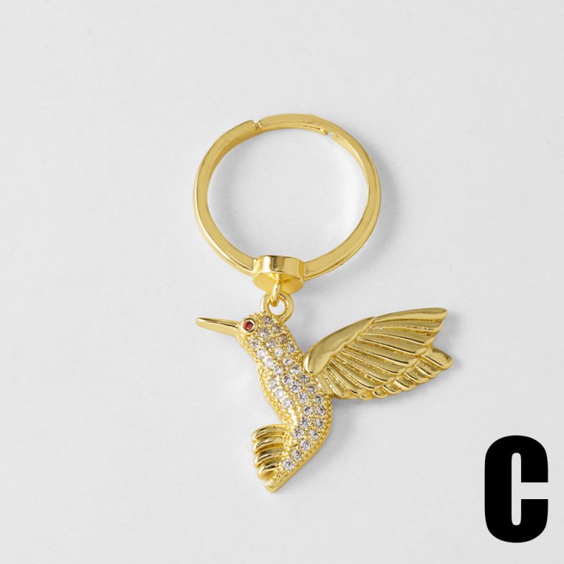 B Copper Diamond Bird Ring