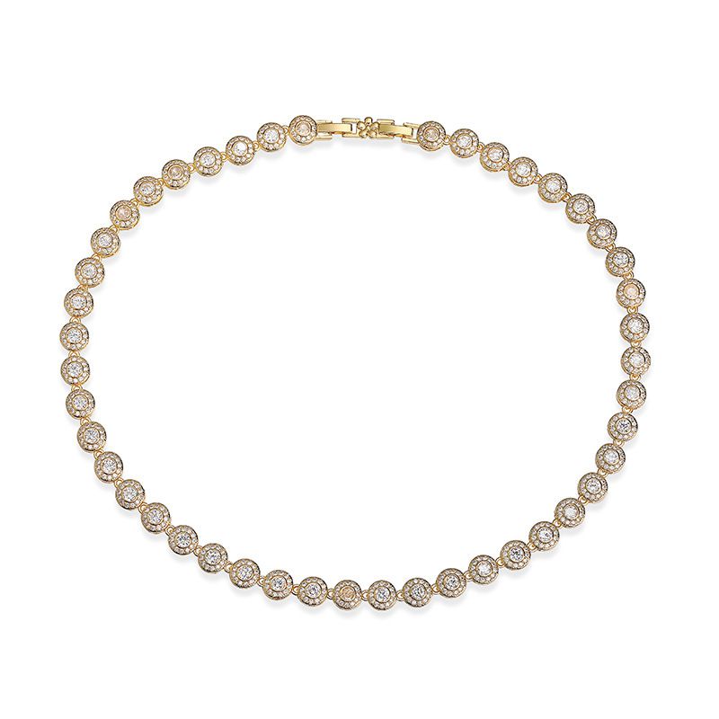 A Pair Of Gold And White Diamond Earrings Brass Round Earrings With Diamonds