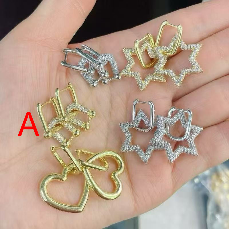 A Brass And Diamond Horseshoe Earrings