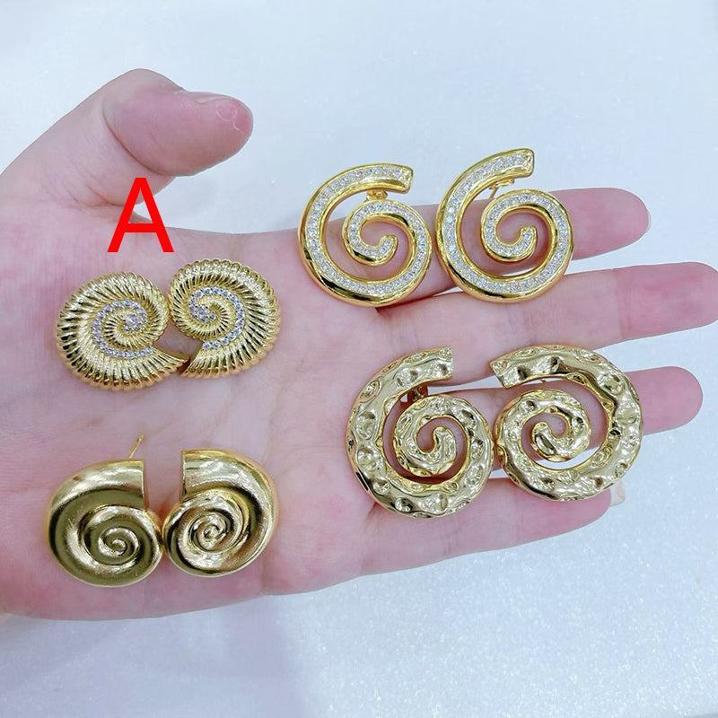 A Copper And Diamond-encrusted Conch Earrings