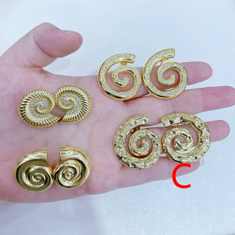 A Copper And Diamond-encrusted Conch Earrings