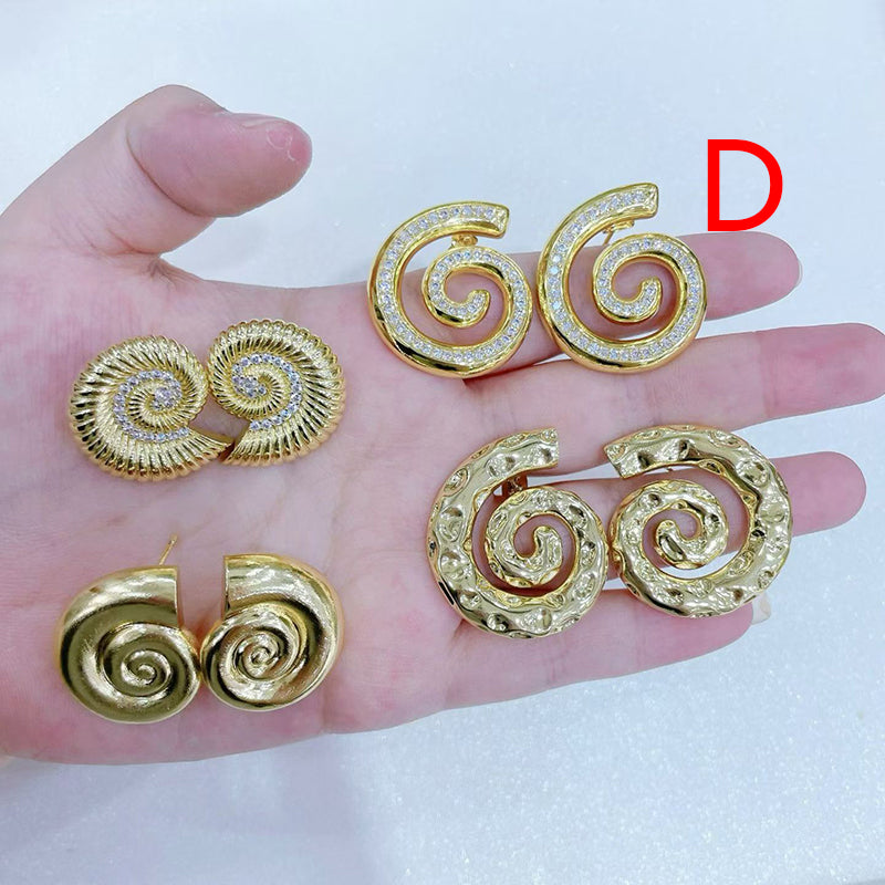 A Copper And Diamond-encrusted Conch Earrings