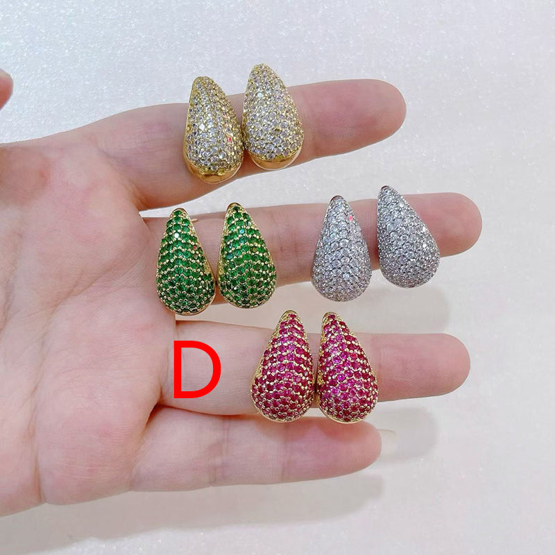 A Copper And Diamond-encrusted Teardrop-shaped Earrings