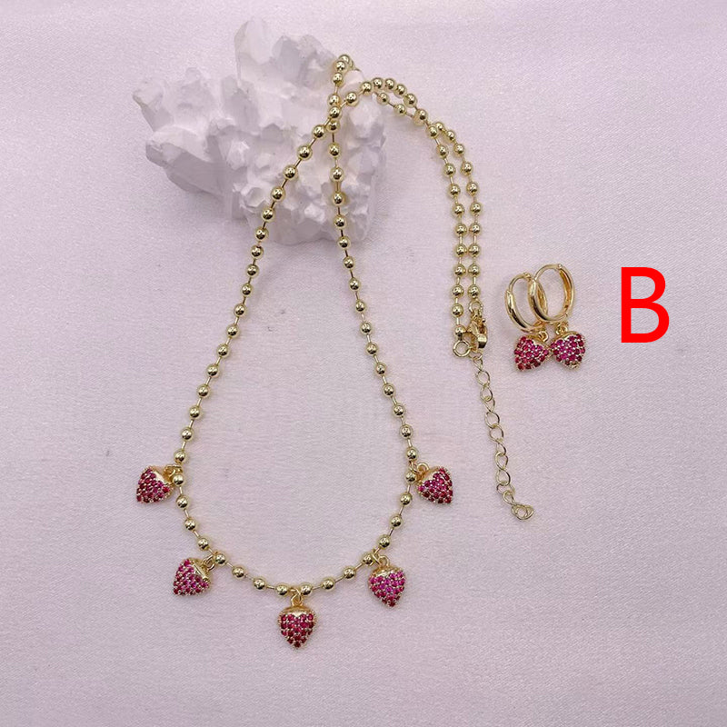 A Copper And Diamond-encrusted Strawberry Necklace