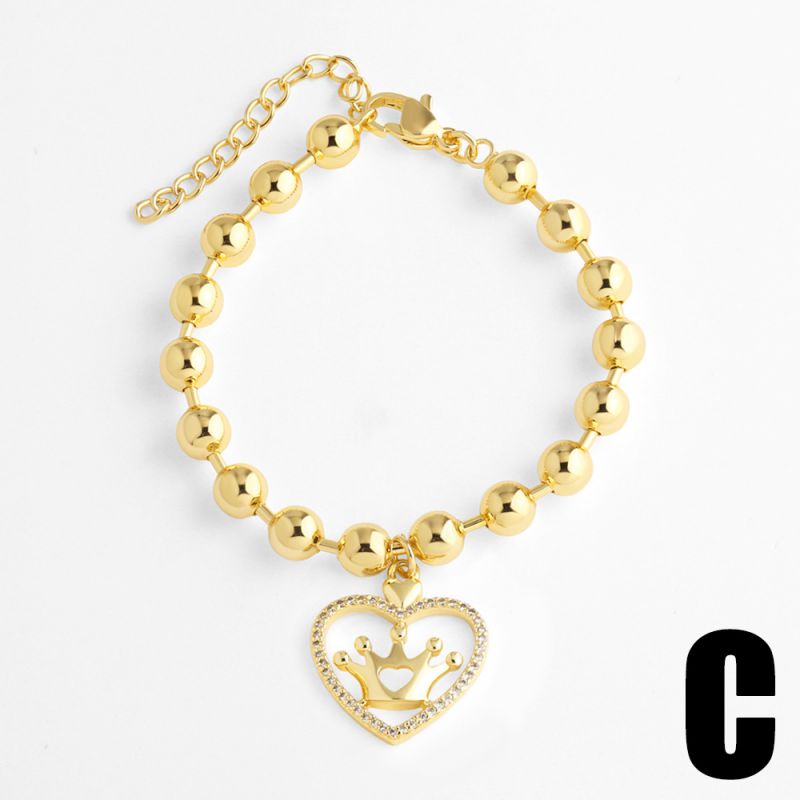 A Copper Diamond-encrusted Heart Cross Bracelet