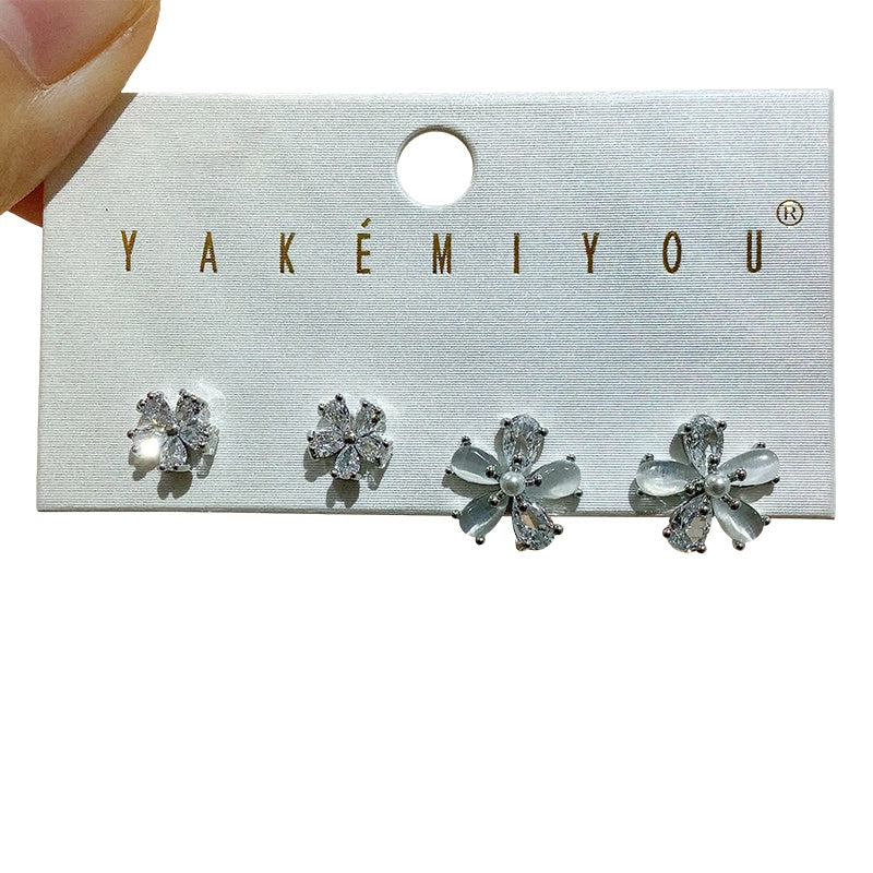 Gold 4-piece Set Of Copper-set Zircon Flower And Pearl Earrings