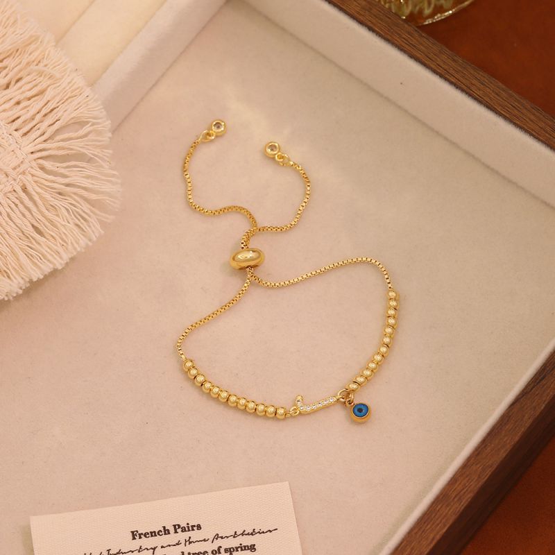 A Copper 26-letter Eye Bracelet