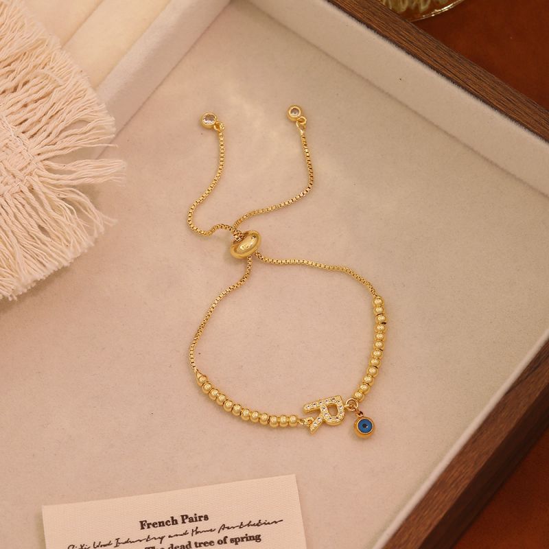 A Copper 26-letter Eye Bracelet