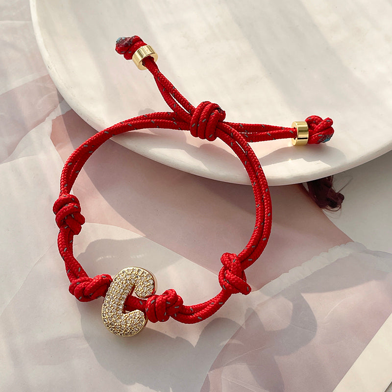 A Gold Copper-set Zircon 26-letter Alphabet Bracelet