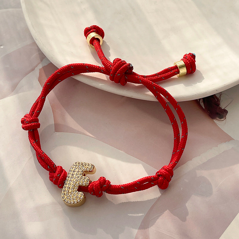 A Gold Copper-set Zircon 26-letter Alphabet Bracelet