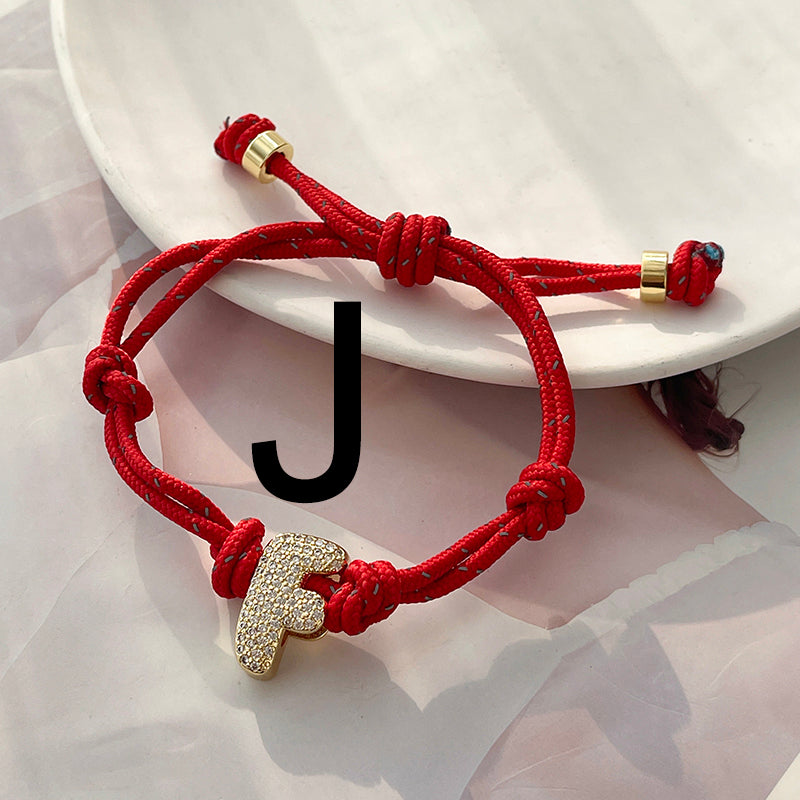 A Gold Copper-set Zircon 26-letter Alphabet Bracelet