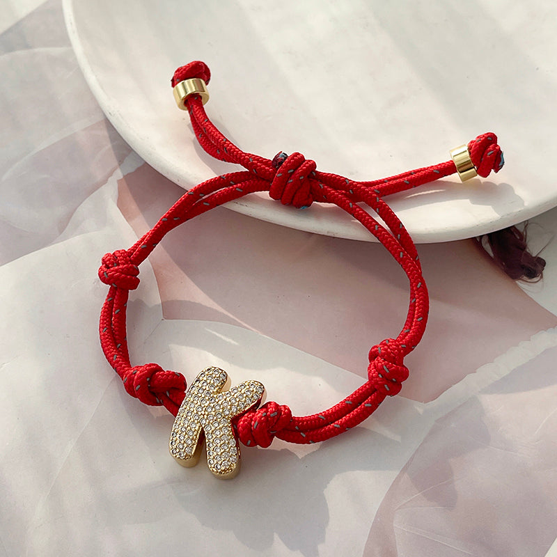 A Gold Copper-set Zircon 26-letter Alphabet Bracelet