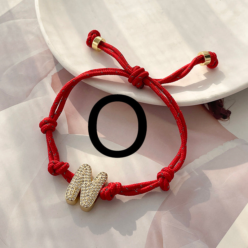 A Gold Copper-set Zircon 26-letter Alphabet Bracelet