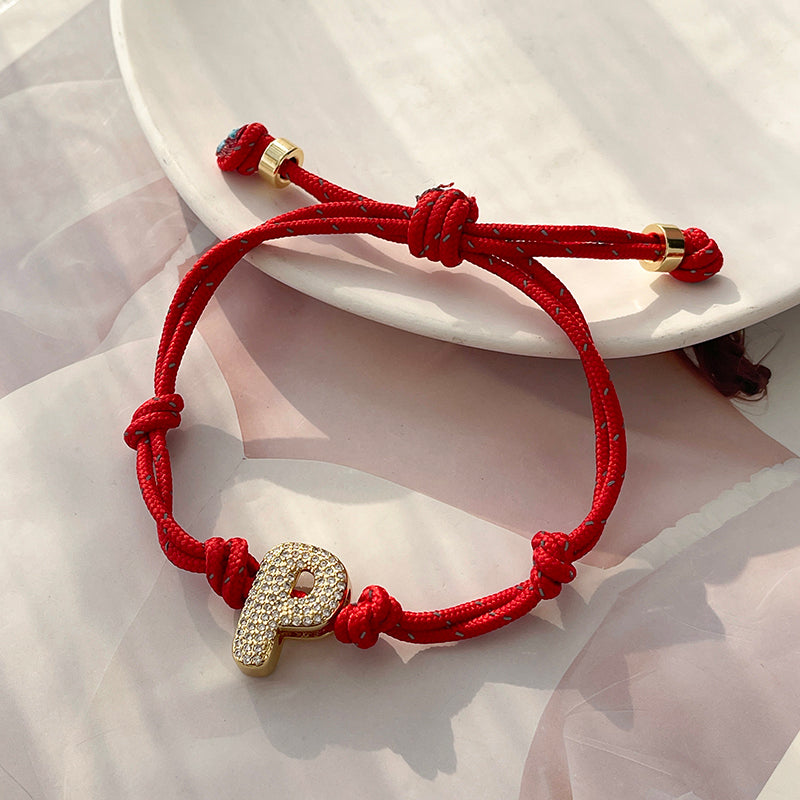 A Gold Copper-set Zircon 26-letter Alphabet Bracelet