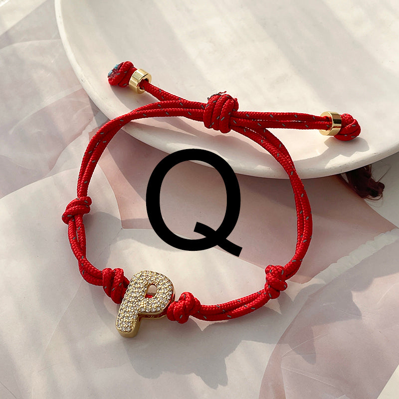 A Gold Copper-set Zircon 26-letter Alphabet Bracelet