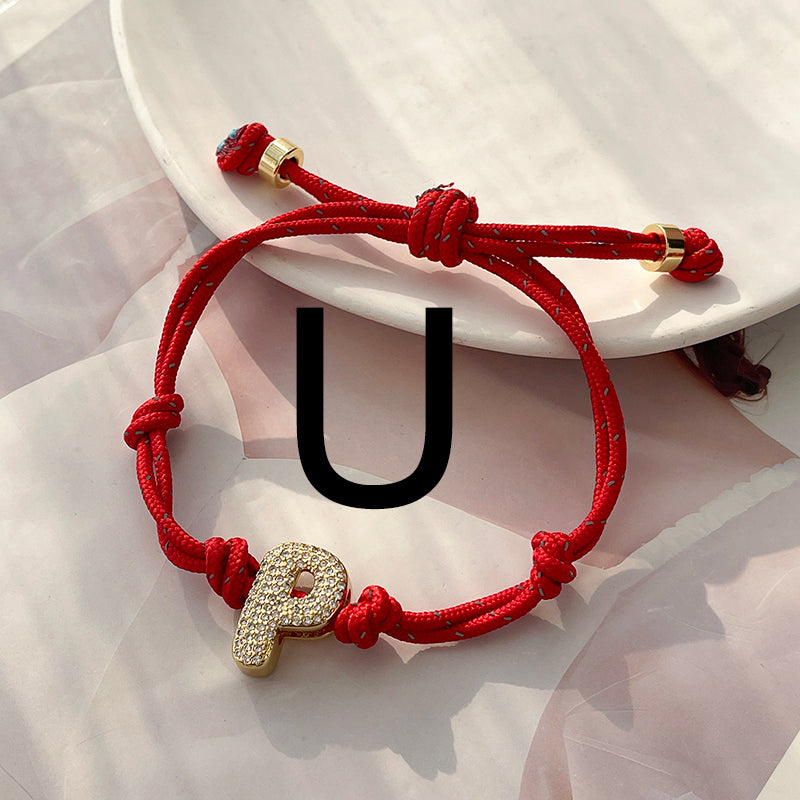 A Gold Copper-set Zircon 26-letter Alphabet Bracelet