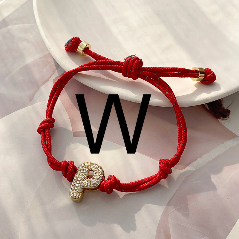 A Gold Copper-set Zircon 26-letter Alphabet Bracelet