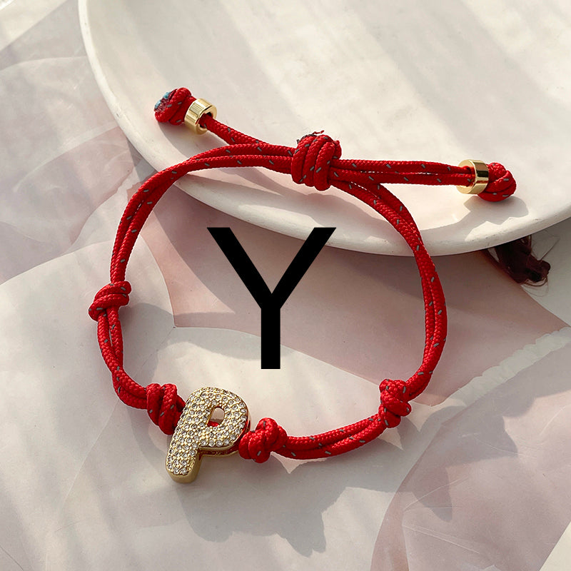 A Gold Copper-set Zircon 26-letter Alphabet Bracelet