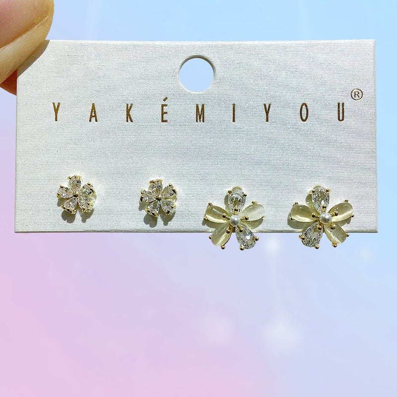 Gold 4-piece Set Of Copper-set Zircon Flower And Pearl Earrings