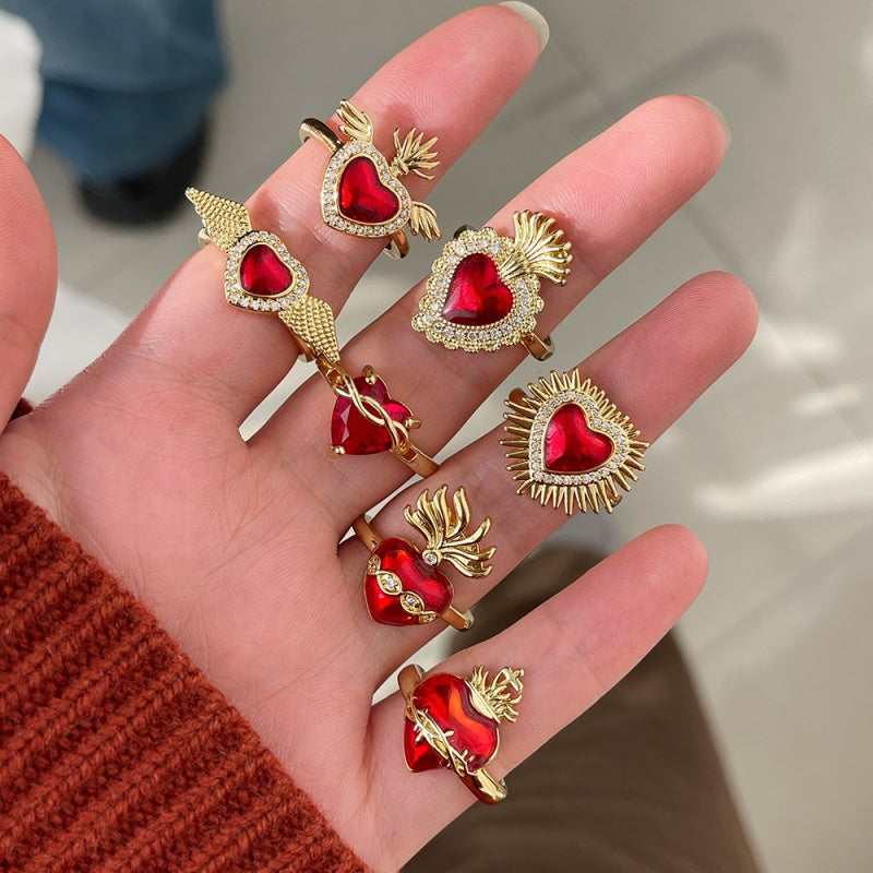 Red 2 Copper Ring With Zircon Setting And Irregular Heart-shaped Opening.